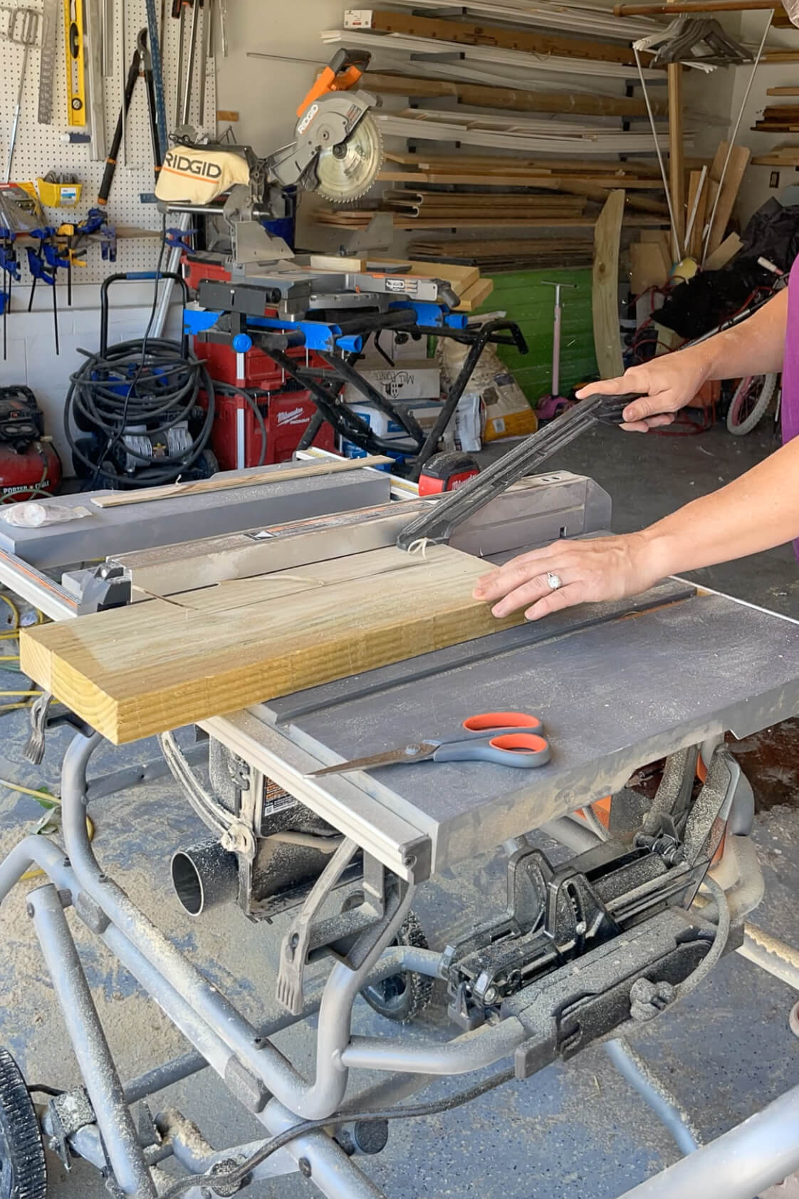 Cutting wood on a table saw. 
